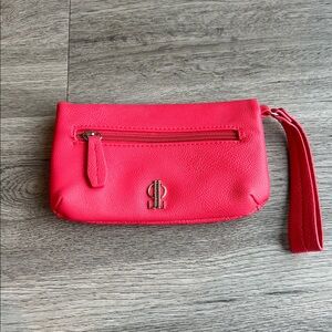 JLO Bright Coral Faux Leather Wristlet Clutch.